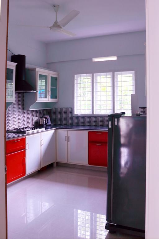 شقة En Jays Residency كوتايم المظهر الخارجي الصورة