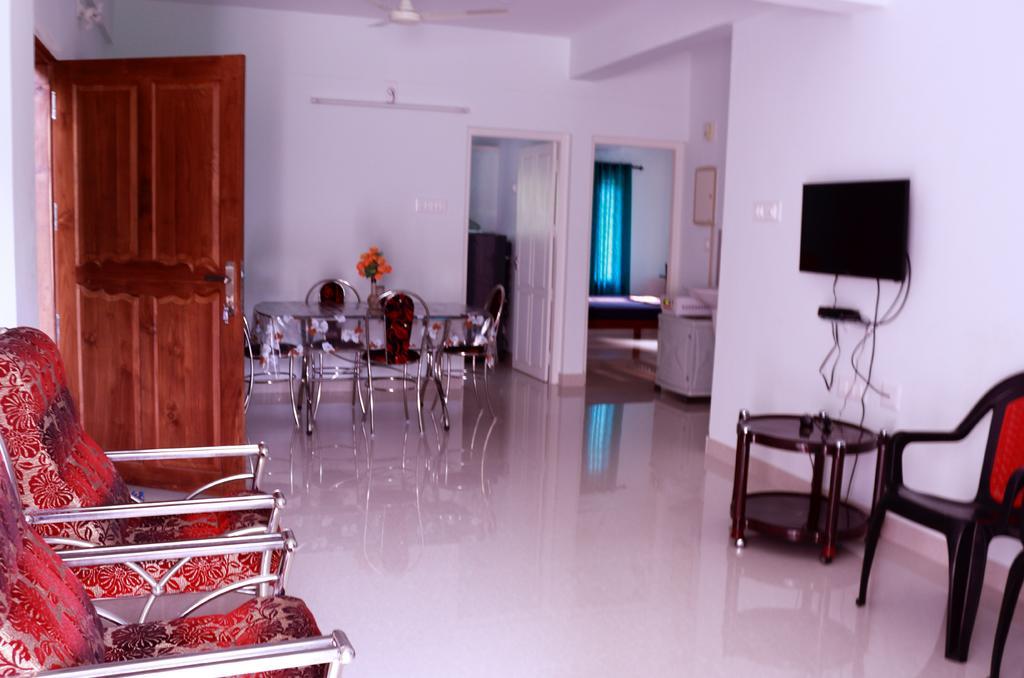 شقة En Jays Residency كوتايم المظهر الخارجي الصورة