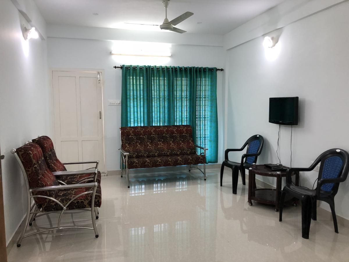 شقة En Jays Residency كوتايم المظهر الخارجي الصورة