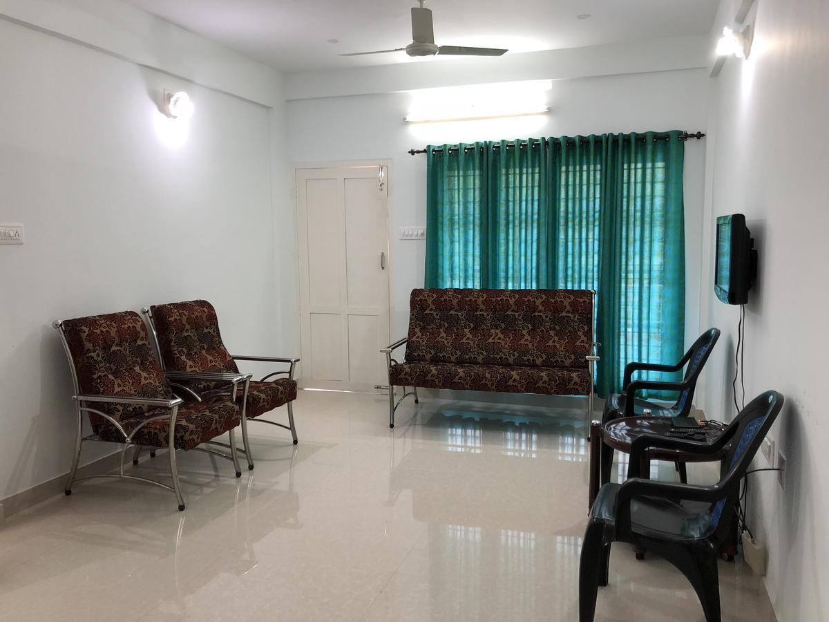 شقة En Jays Residency كوتايم المظهر الخارجي الصورة