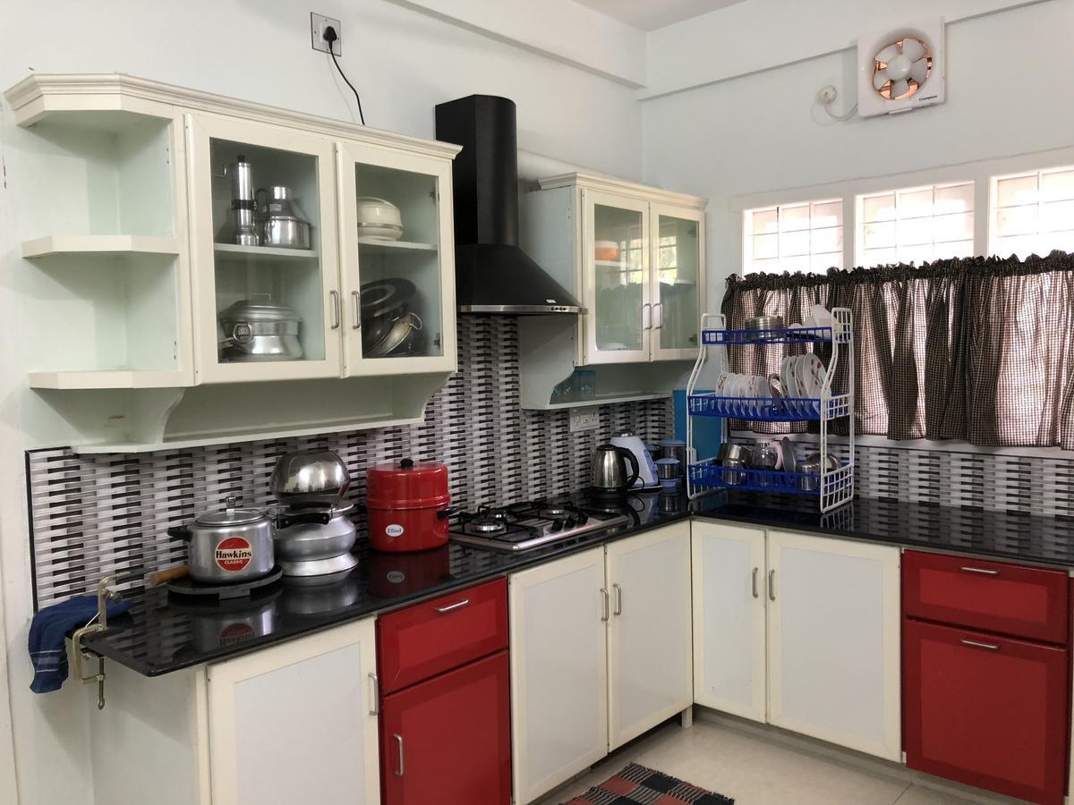 شقة En Jays Residency كوتايم المظهر الخارجي الصورة