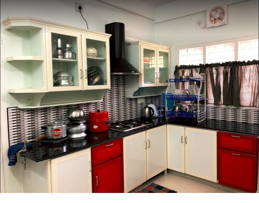 شقة En Jays Residency كوتايم المظهر الخارجي الصورة